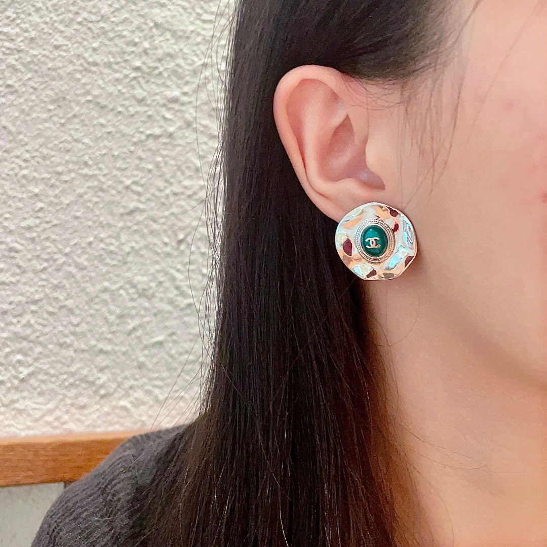 Double-C Emblem Stud Earrings in Polished Metal-Tone – Design 239 detail view