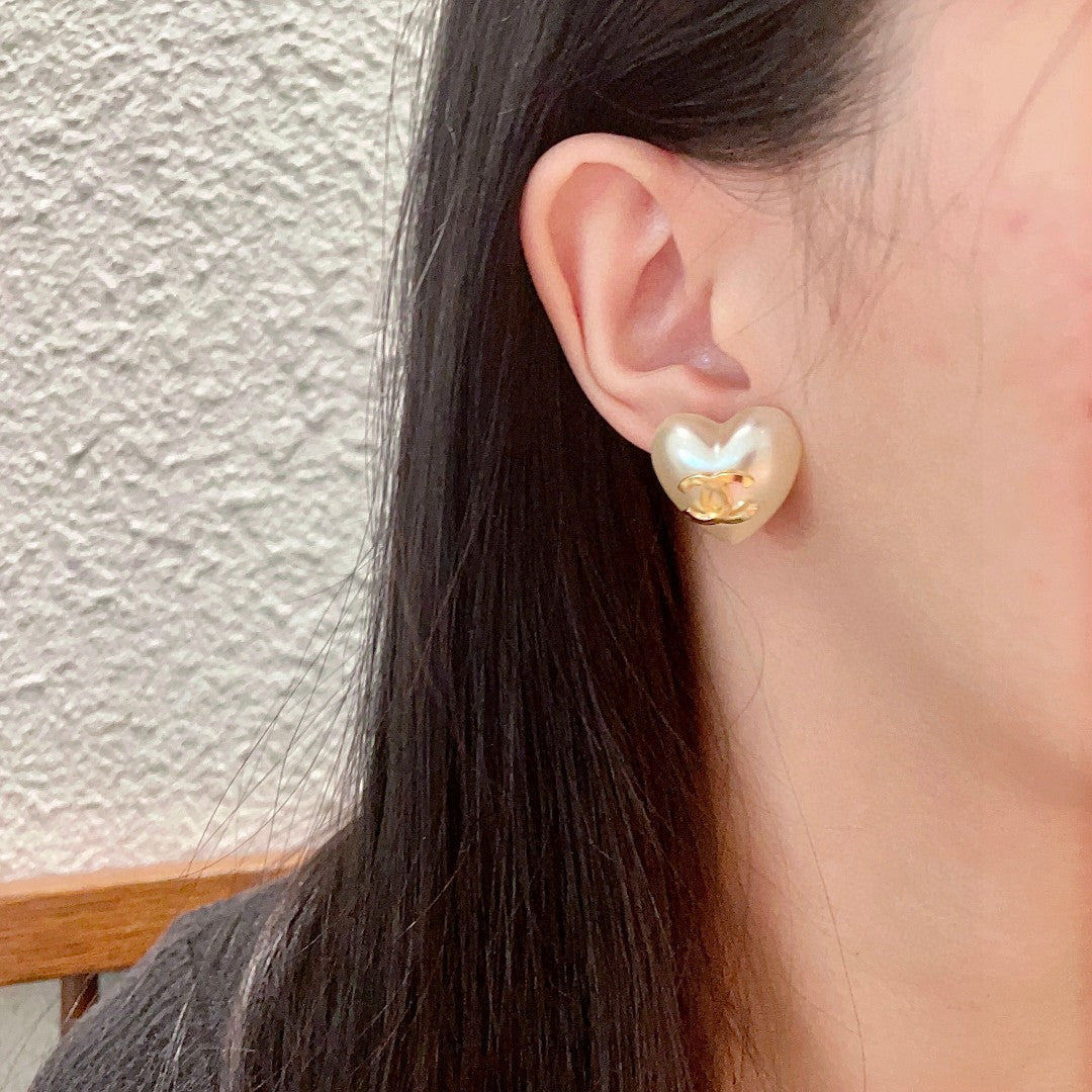 Double-C Emblem Stud Earrings in Polished Metal-Tone – Heart Detail – Design 006 detail view
