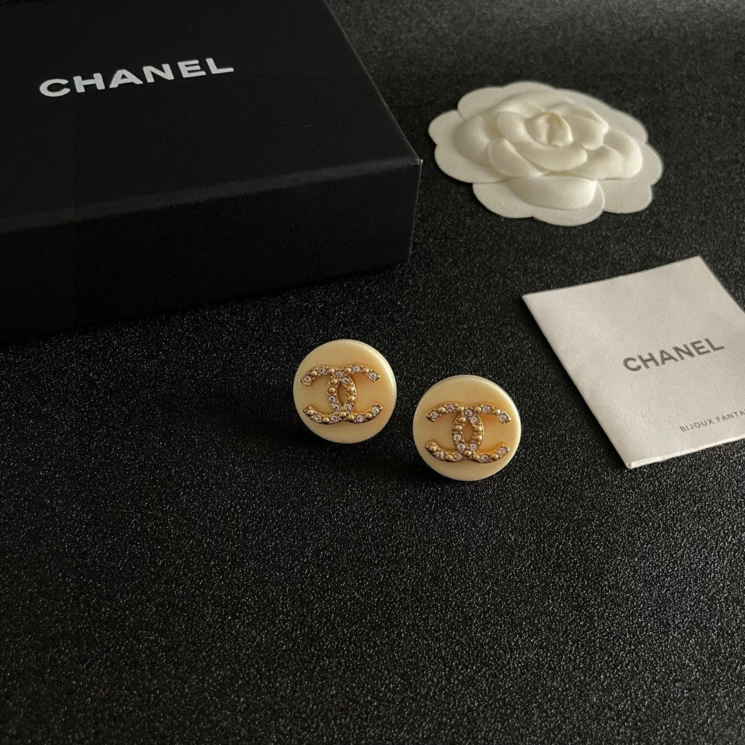Double-C Emblem Stud Earrings in Polished Metal-Tone – Design 220 styled product view