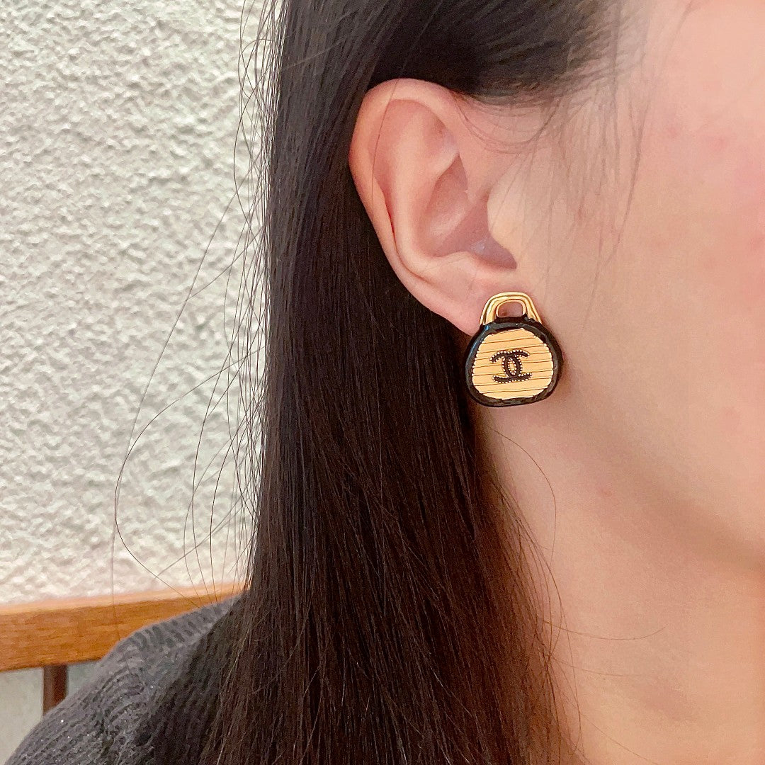 Double-C Emblem Stud Earrings in Polished Metal-Tone – Design 199 detail view