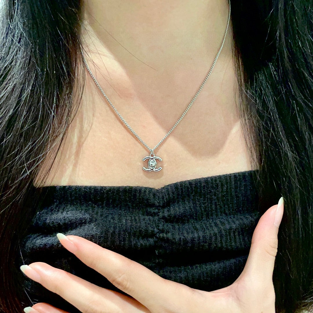 Double-C Emblem Pendant Necklace in Polished Metal-Tone – Design 025 front product view