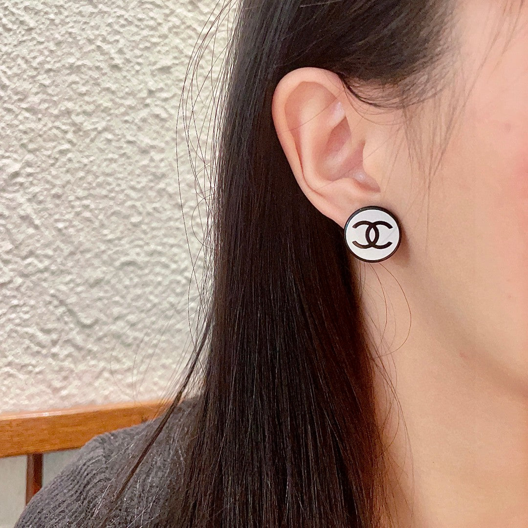 Double-C Emblem Stud Earrings in Polished Metal-Tone – Design 155 detail view