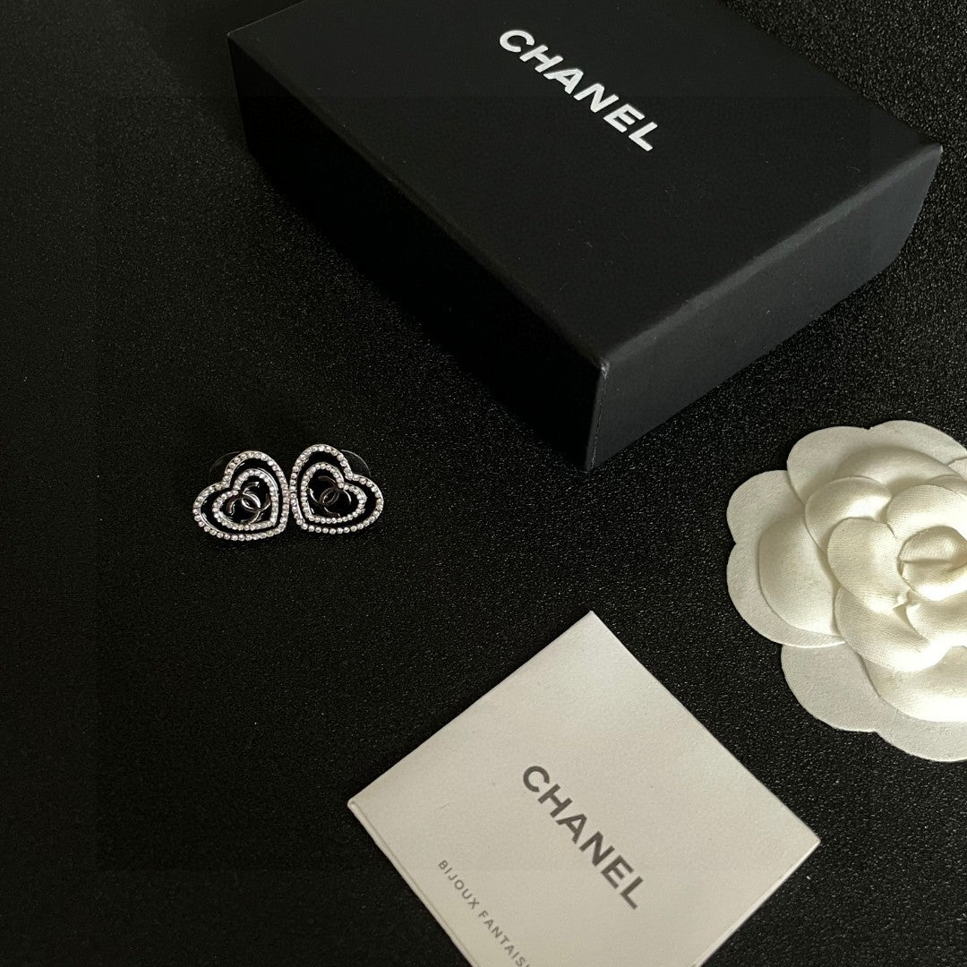 Double-C Emblem Crystal-Accent Stud Earrings – Heart Detail close-up detail
