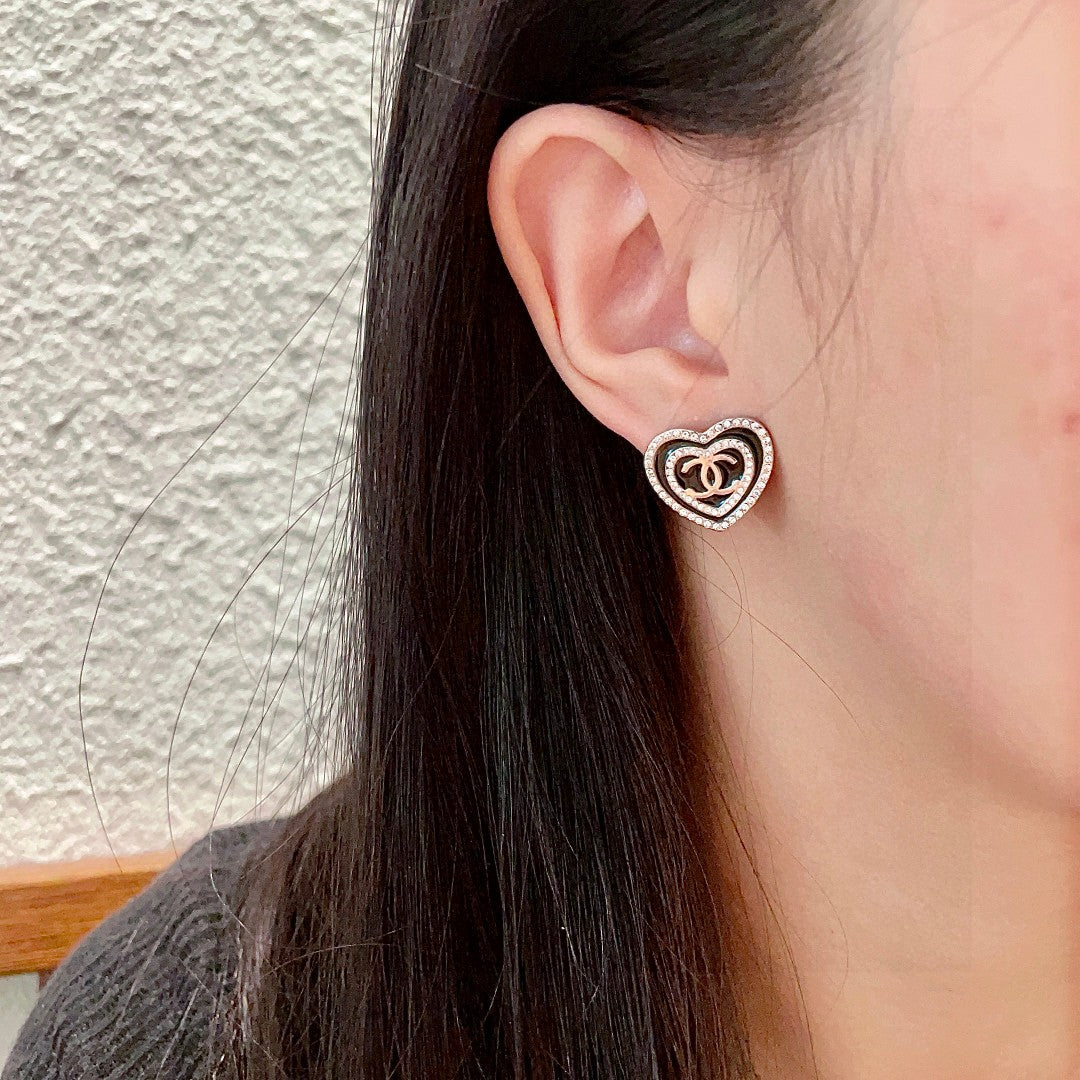 Double-C Emblem Crystal-Accent Stud Earrings – Heart Detail detail view