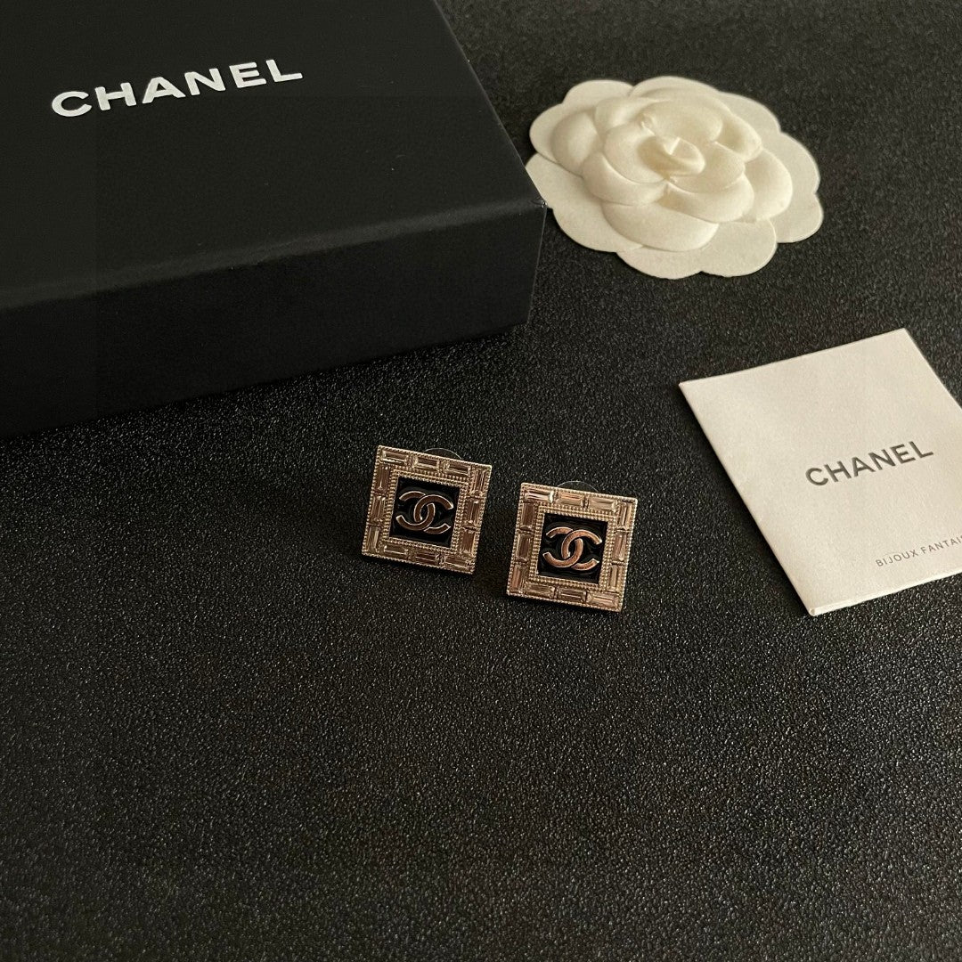 Double-C Emblem Stud Earrings in Polished Metal-Tone – Design 148 styled product view