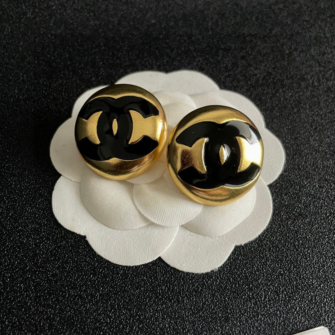 Double-C Emblem Stud Earrings in Polished Metal-Tone – Design 147 front product view