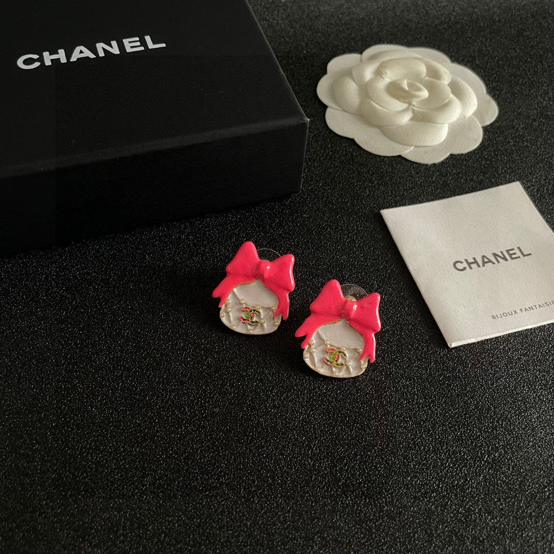 Double-C Emblem Stud Earrings in Polished Metal-Tone – Design 145 styled product view
