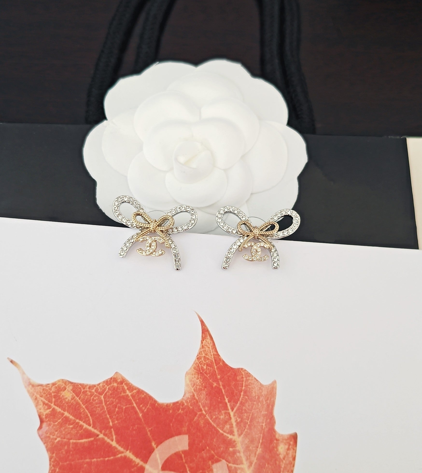 Bow Statement Earrings in Gold-Tone styled product view
