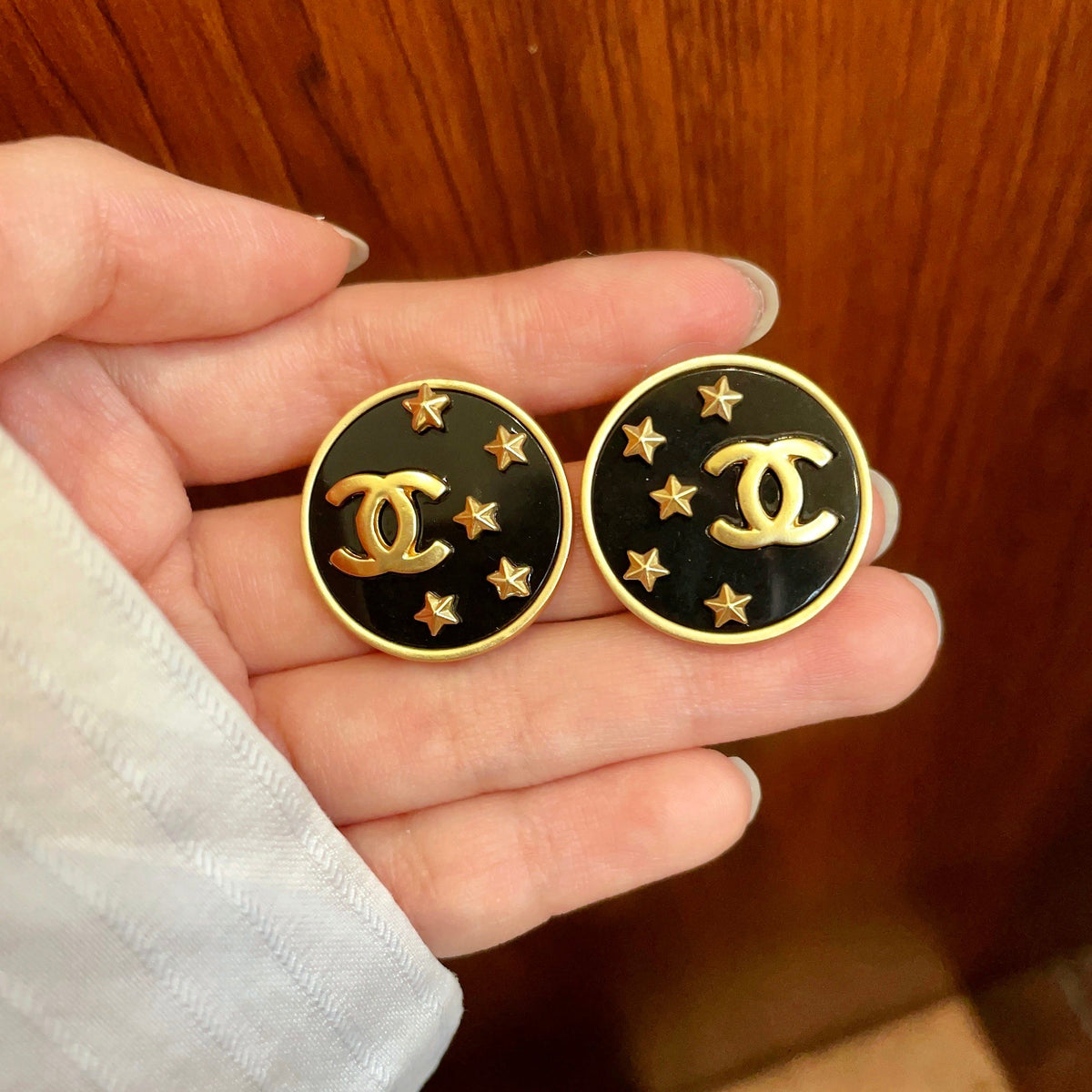 Double-C Emblem Stud Earrings in Polished Metal-Tone – Star Detail – Design 007 side detail