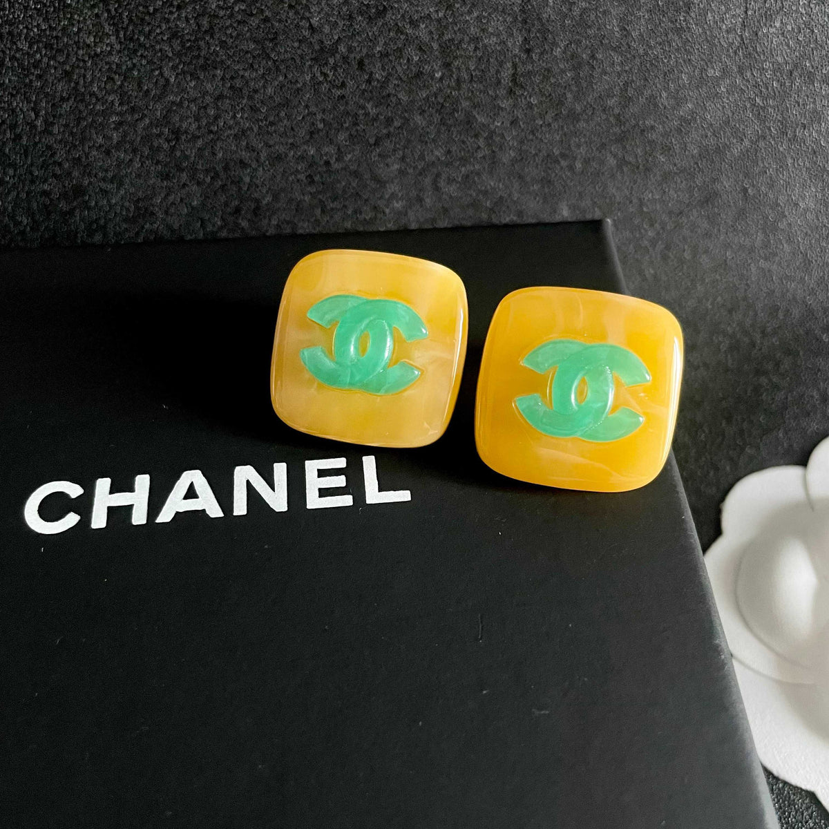 Double-C Emblem Stud Earrings in Polished Metal-Tone – Design 326 detail view