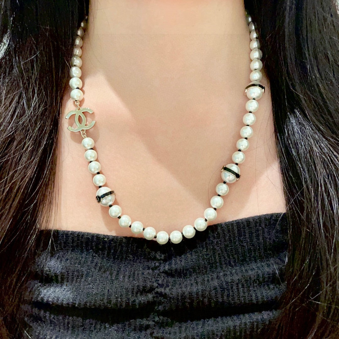 Double-C Emblem Pearl-Detail Pendant Necklace – Pearl Detail – Design 100 detail view