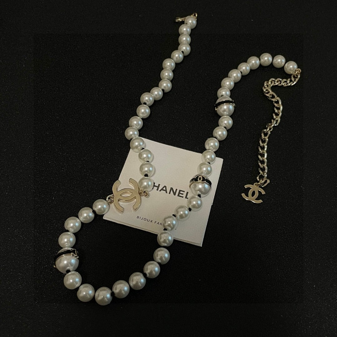 Double-C Emblem Pearl-Detail Pendant Necklace – Pearl Detail – Design 100 main product view