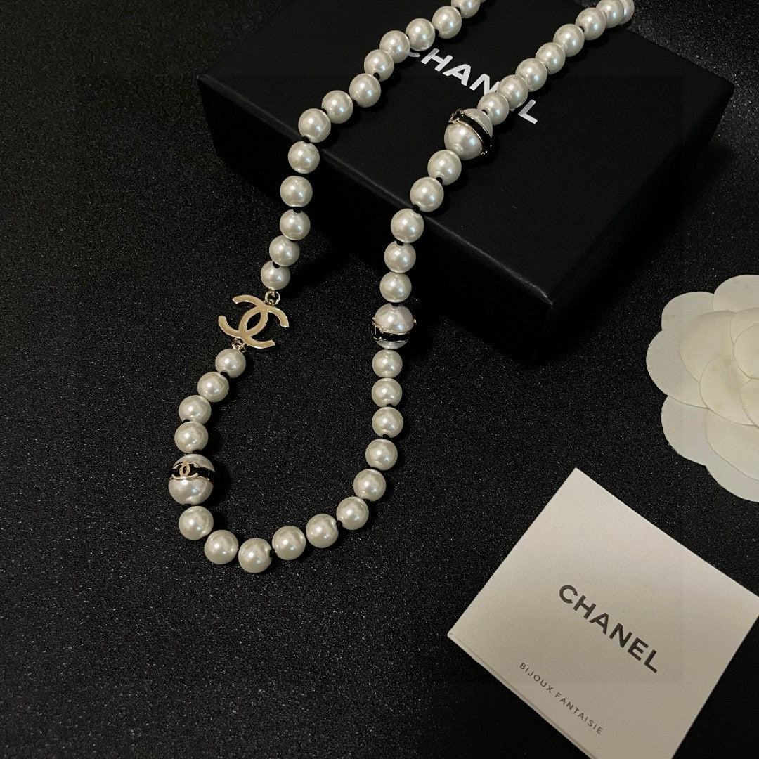 Double-C Emblem Pearl-Detail Pendant Necklace – Pearl Detail – Design 100 styled product view