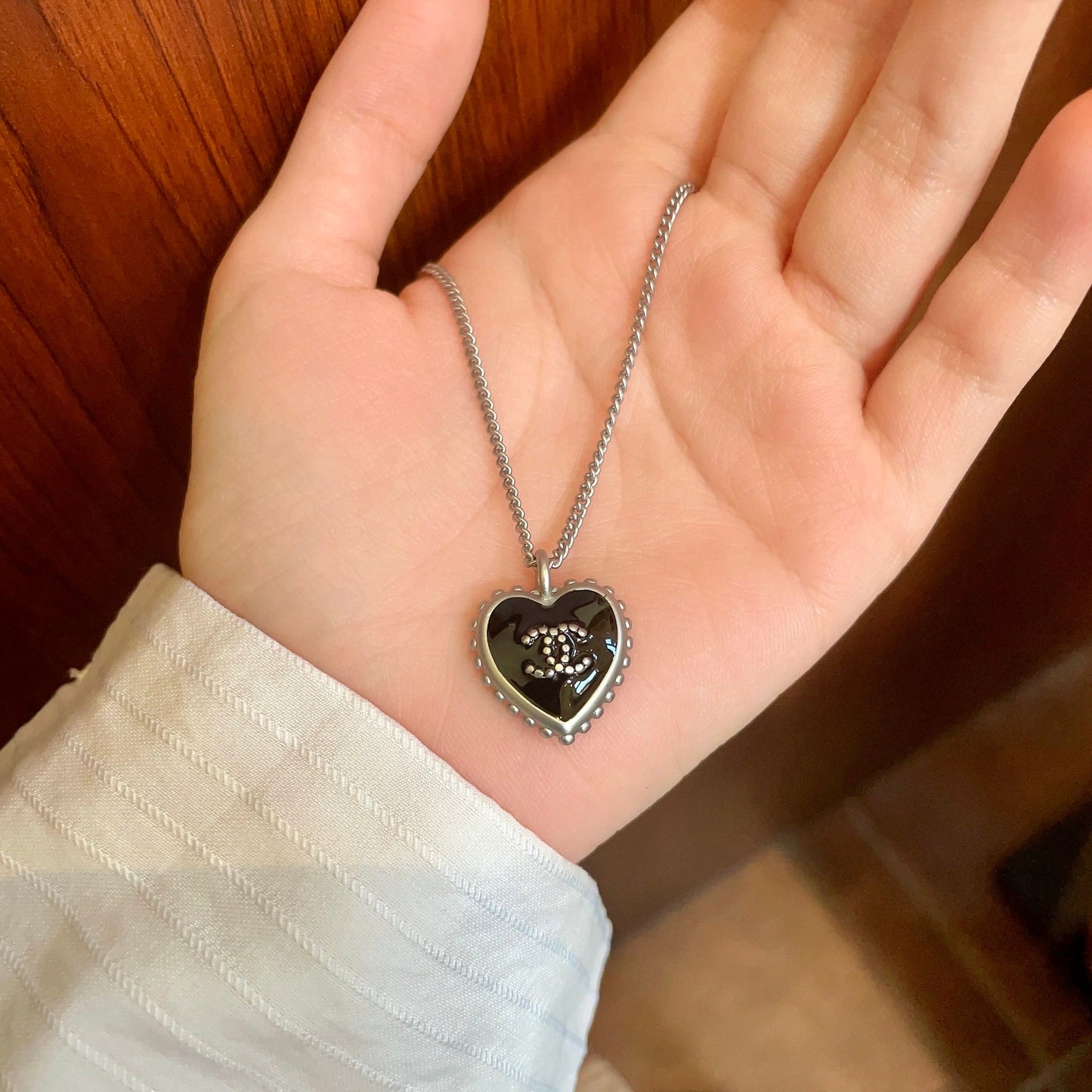Double-C Emblem Pendant Necklace in Polished Metal-Tone – Heart Detail – Design 005 side detail