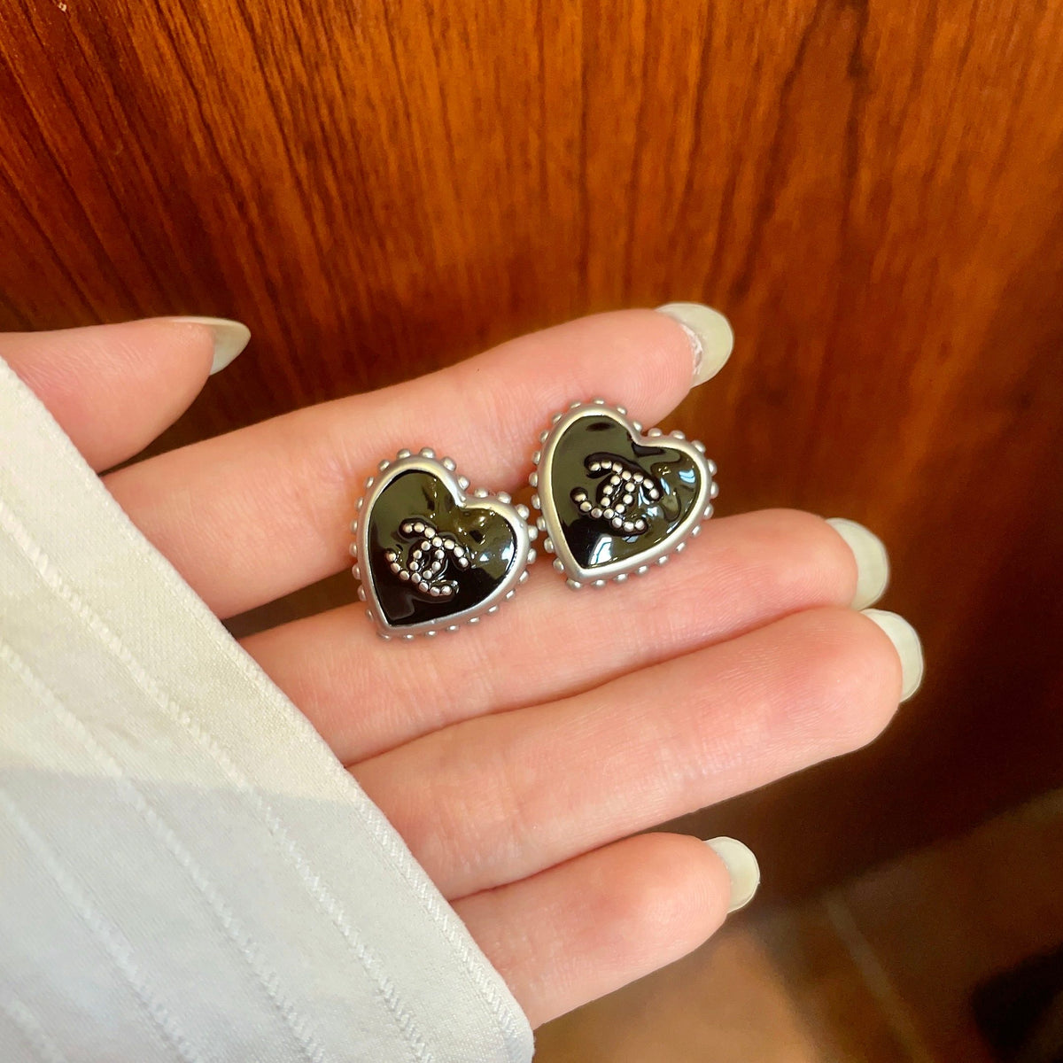 Double-C Emblem Stud Earrings in Polished Metal-Tone – Heart Detail – Design 012 side detail