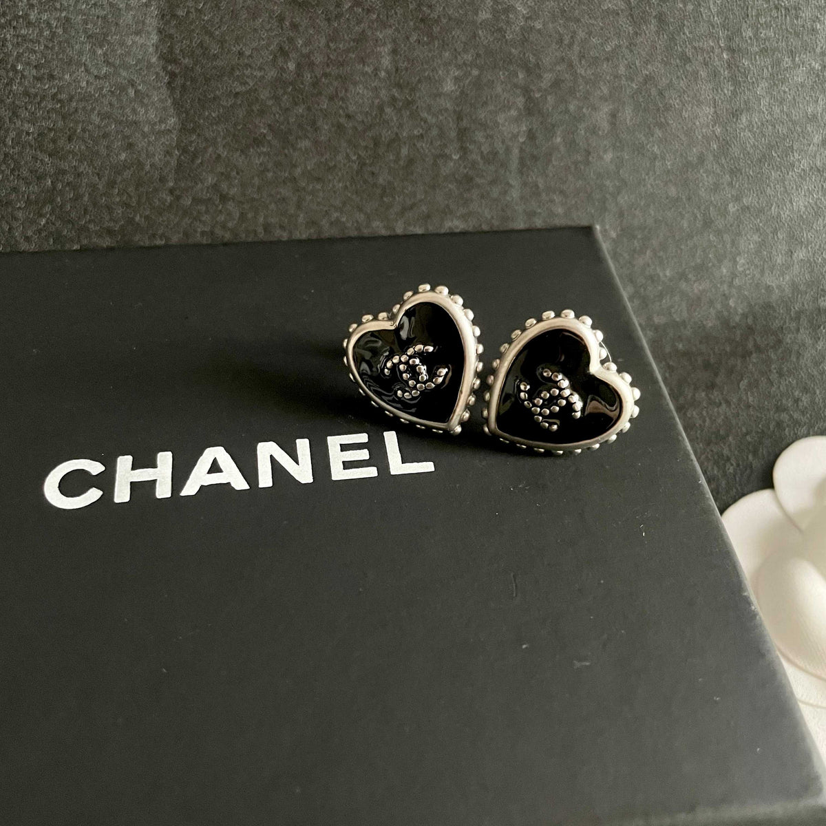 Double-C Emblem Stud Earrings in Polished Metal-Tone – Heart Detail – Design 012 detail view