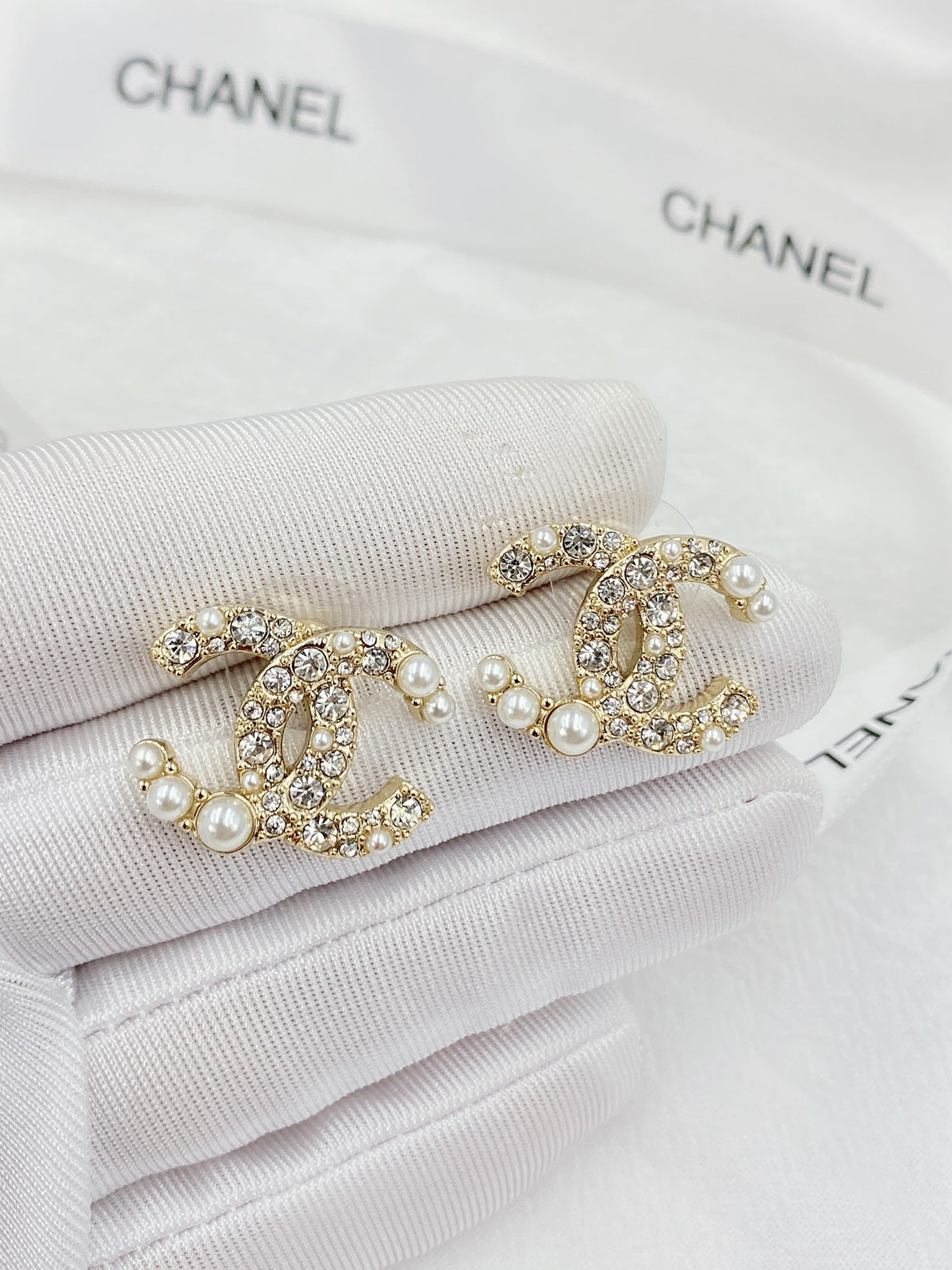 Double-C Emblem Pearl-Detail Stud Earrings – Pearl Detail – Design 007 styled product view