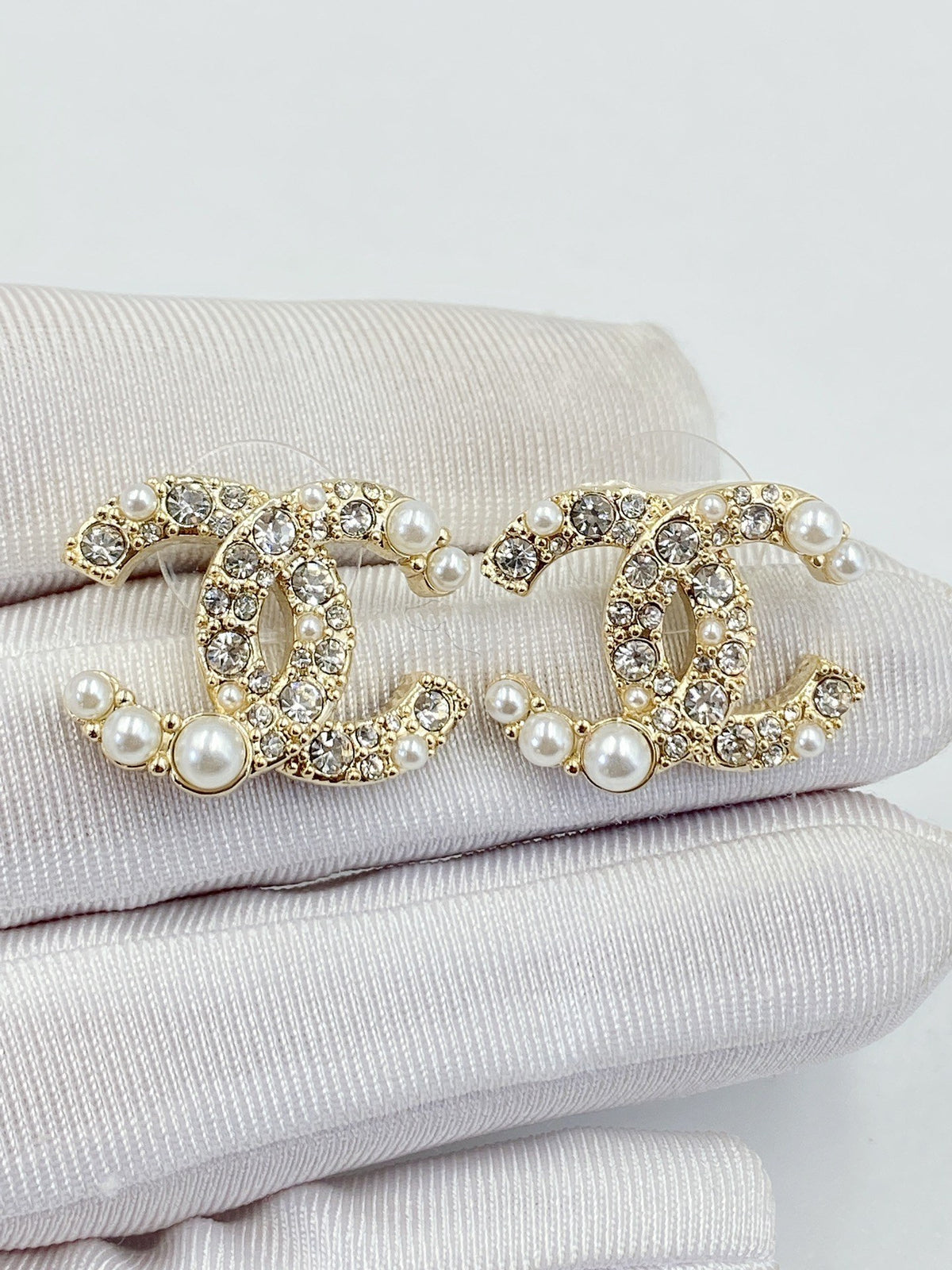 Double-C Emblem Pearl-Detail Stud Earrings – Pearl Detail – Design 007 front product view