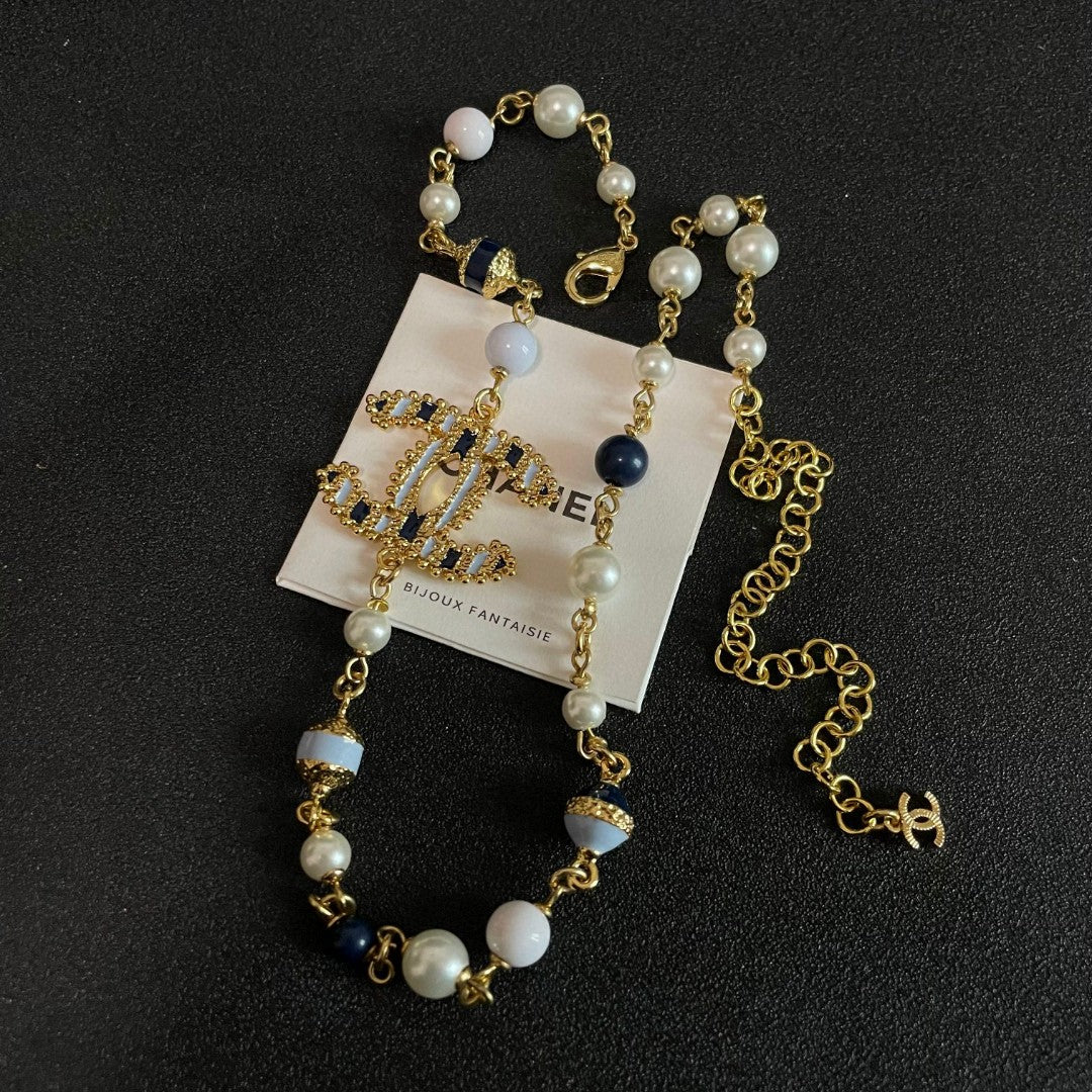 Double-C Emblem Pearl-Detail Pendant Necklace – Pearl Detail – Design 093 close-up detail