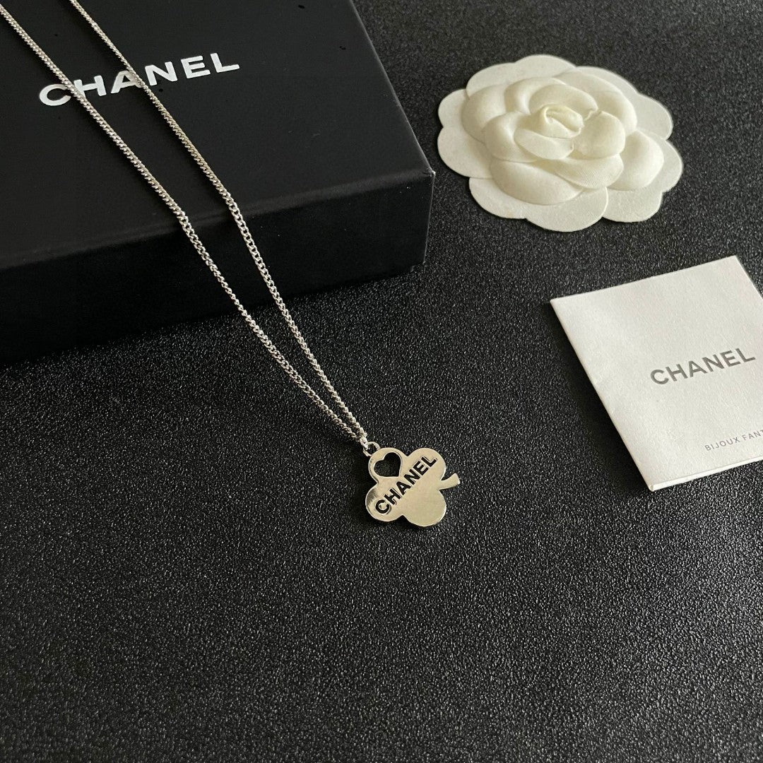 Camellia Pendant Necklace in Polished Metal-Tone – Camellia Detail – Design 024 styled product view
