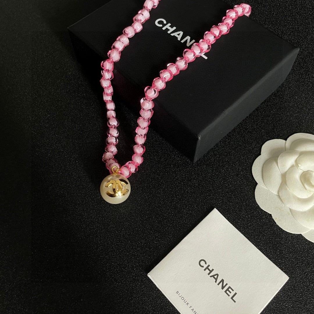 Double-C Emblem Pearl-Detail Pendant Necklace – Pearl Detail – Design 010 close-up detail