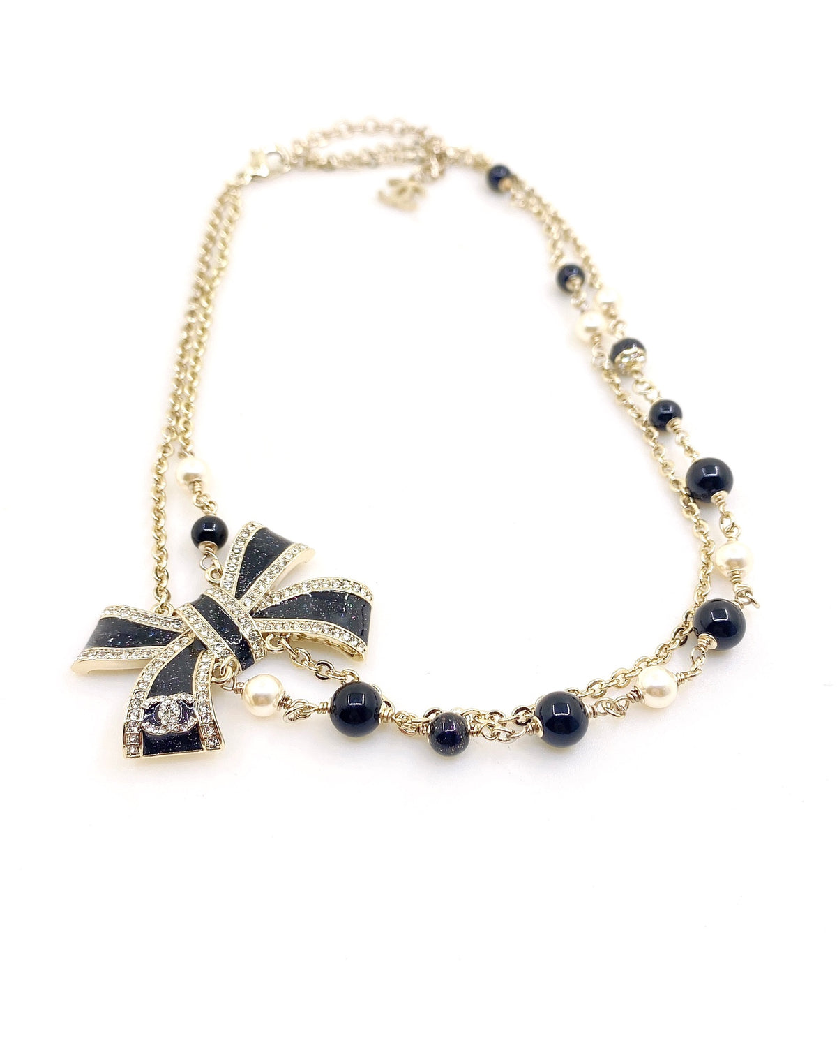 Bow Pendant Necklace in Gold-Tone – Black Detail – Design 003 main product view