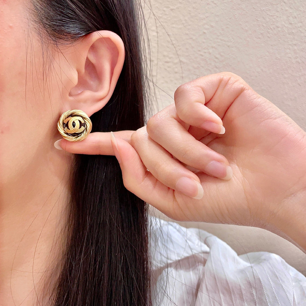 Double-C Emblem Stud Earrings in Polished Metal-Tone – Design 387 front product view