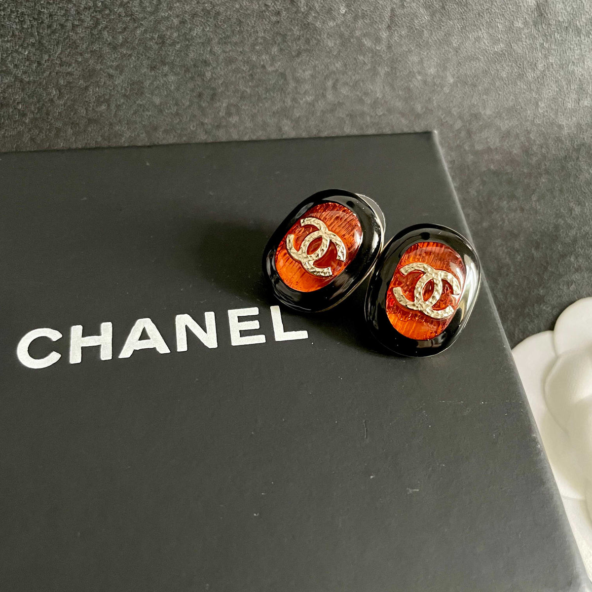 Double-C Emblem Stud Earrings in Polished Metal-Tone – Design 458 detail view