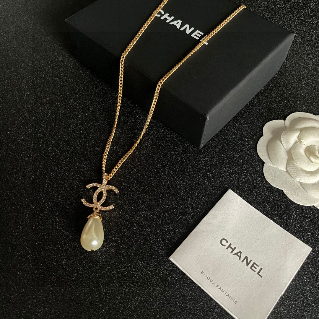 Double-C Emblem Pearl-Detail Pendant Necklace – Pearl Detail – Design 129 close-up detail
