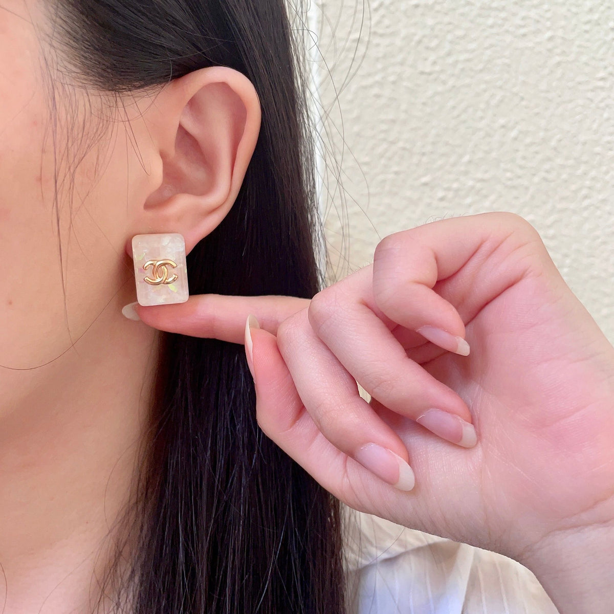 Double-C Emblem Stud Earrings in Polished Metal-Tone – Design 477 front product view