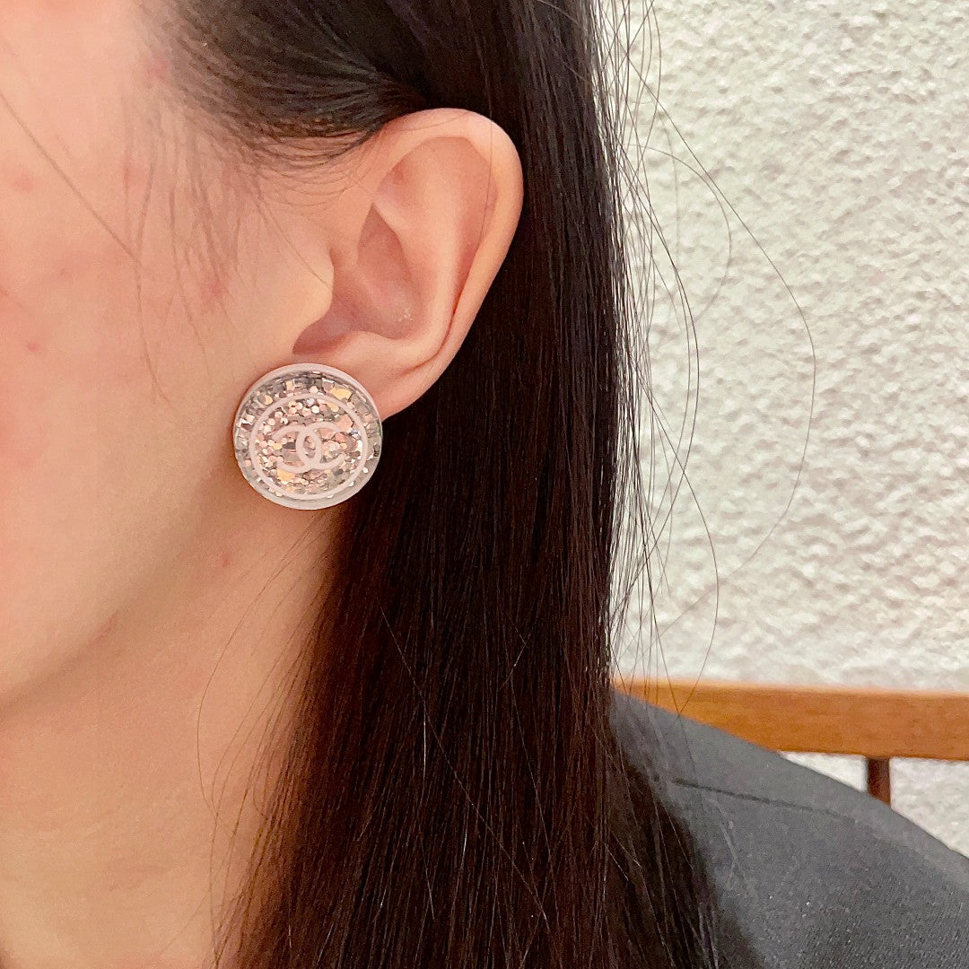 Double-C Emblem Stud Earrings in Polished Metal-Tone – Design 181 detail view