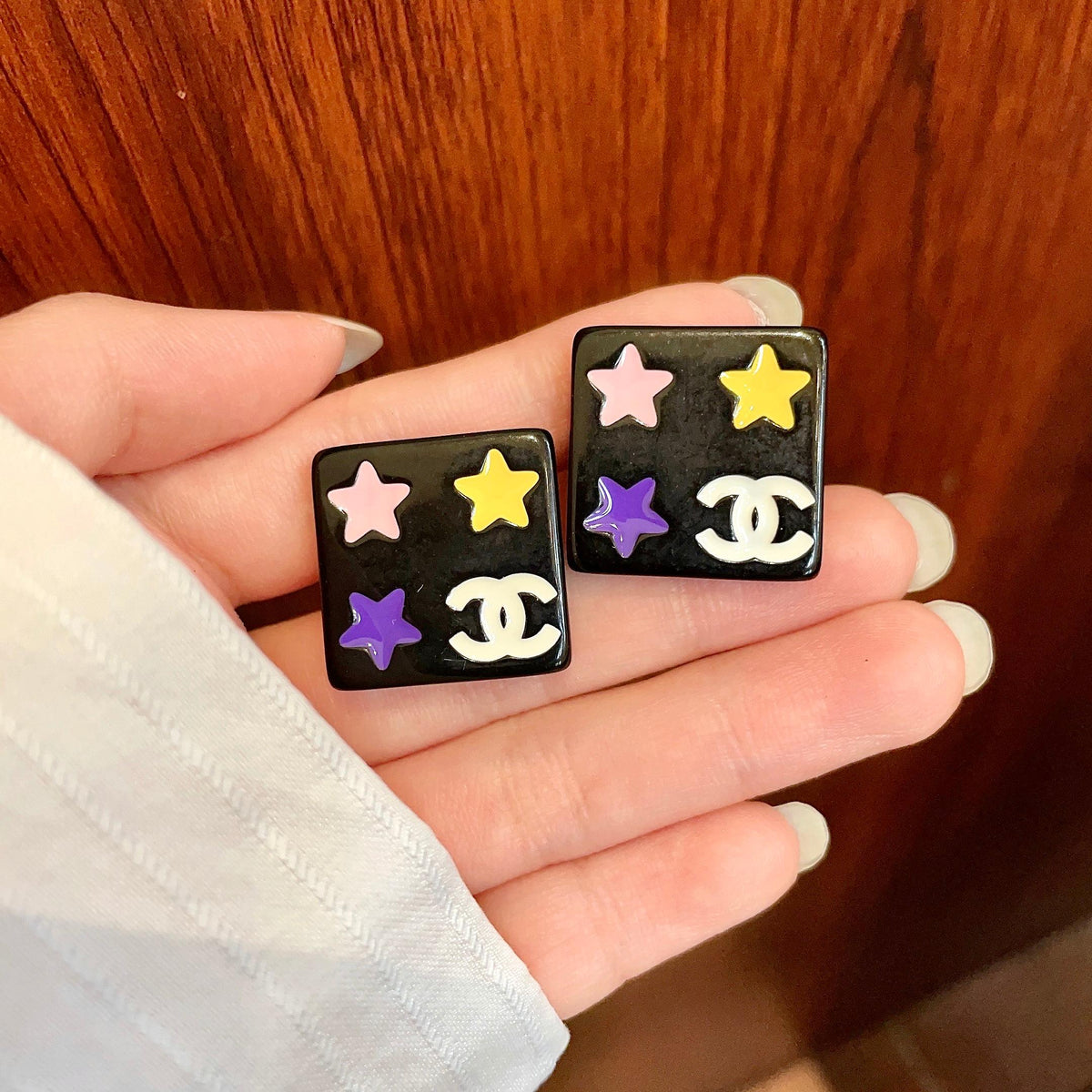 Double-C Emblem Stud Earrings in Polished Metal-Tone – Star Detail – Design 010 side detail