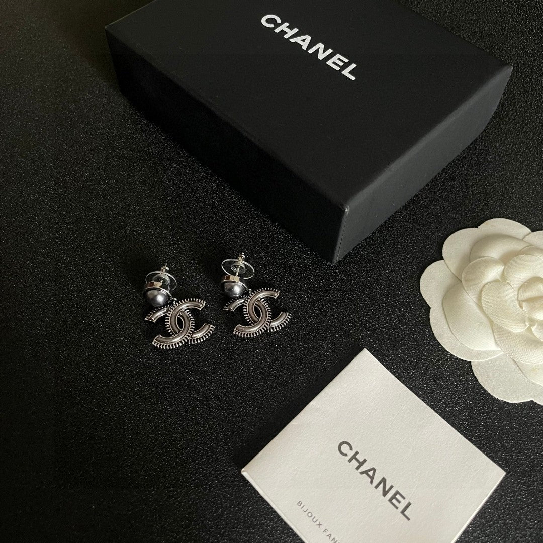 Double-C Emblem Pearl-Detail Statement Earrings – Pearl Detail – Design 013 close-up detail