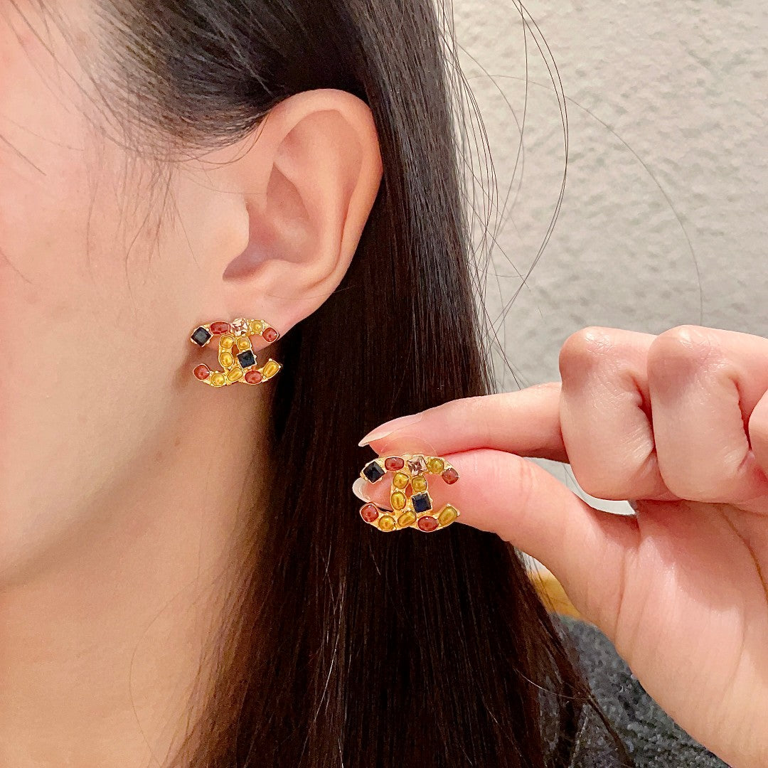 Double-C Emblem Stud Earrings in Polished Metal-Tone – Design 429 main product view