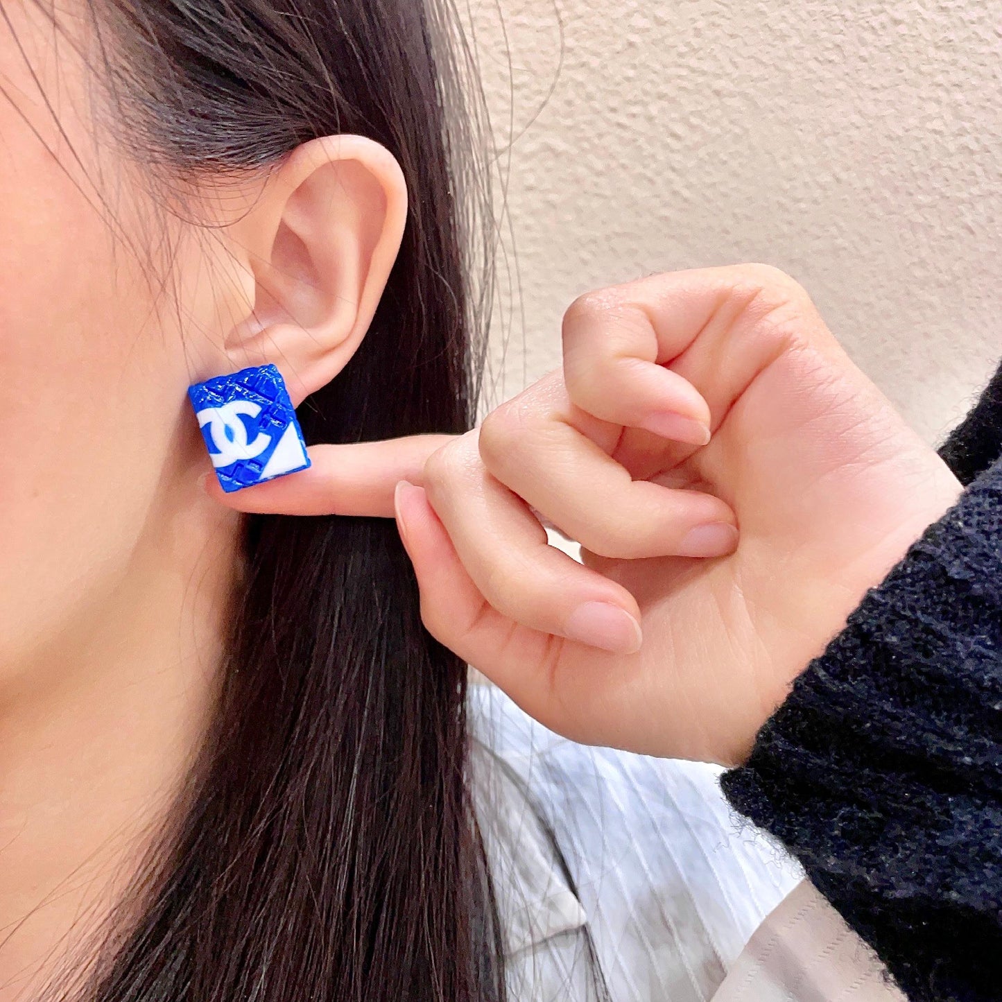 Double-C Emblem Stud Earrings in Polished Metal-Tone – Design 261 front product view