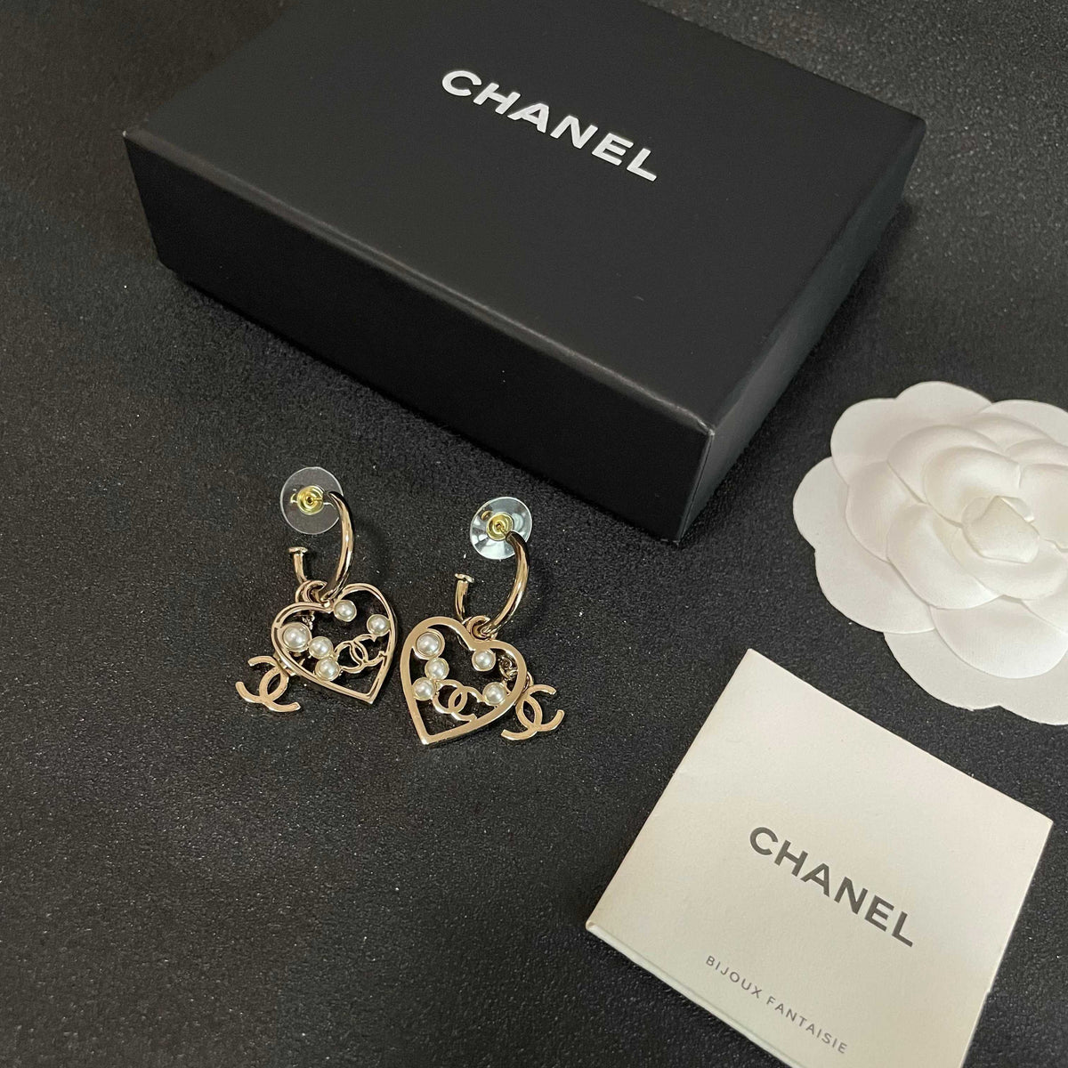 Double-C Emblem Stud Earrings in Polished Metal-Tone – Heart Detail – Design 008 close-up detail