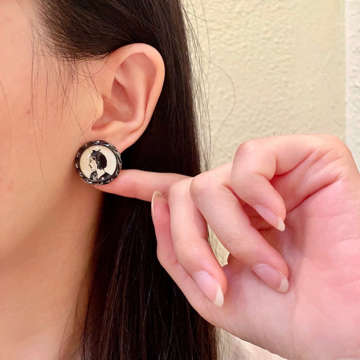 Double-C Emblem Stud Earrings in Polished Metal-Tone – Design 255 front product view