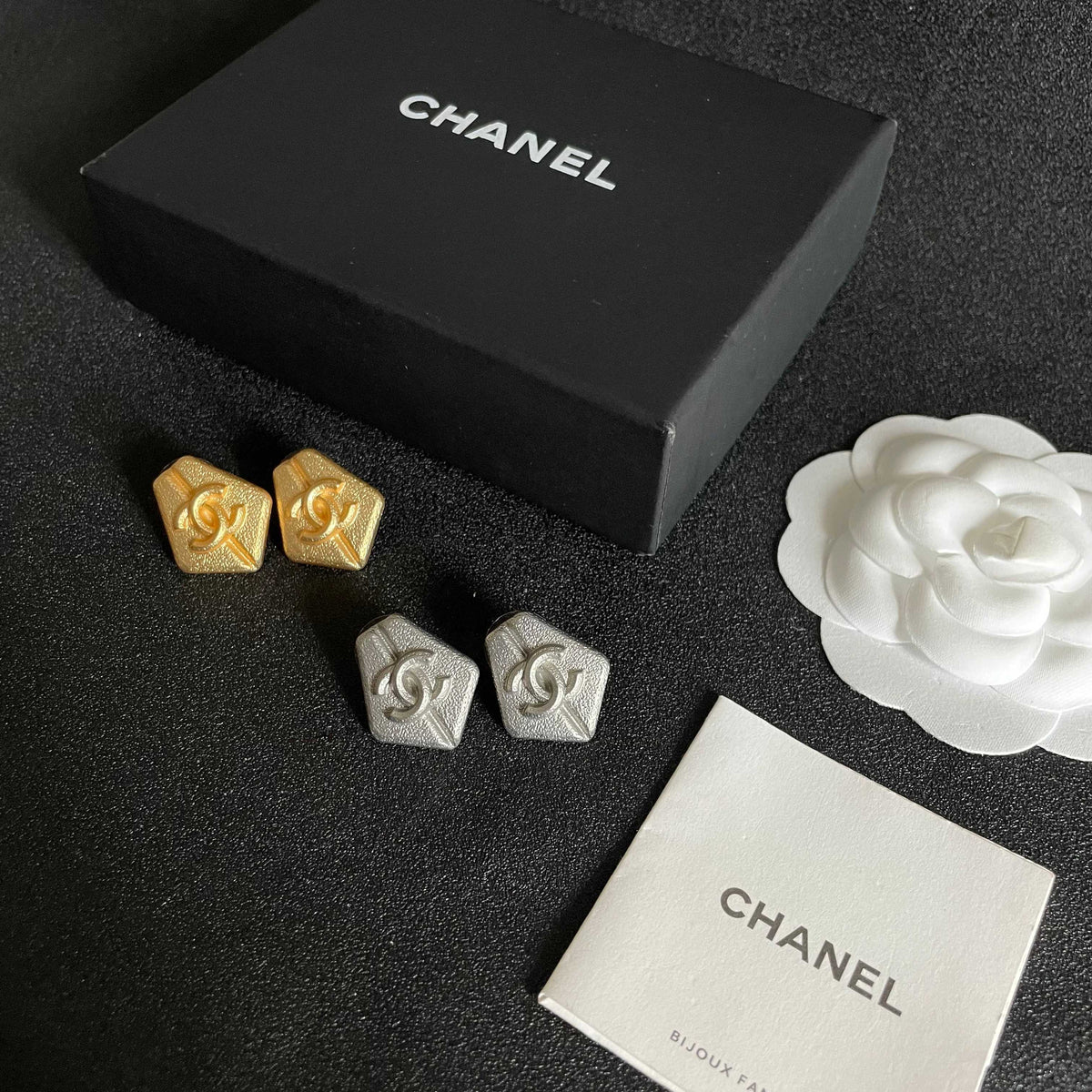 Double-C Emblem Stud Earrings in Polished Metal-Tone – Design 288 close-up detail