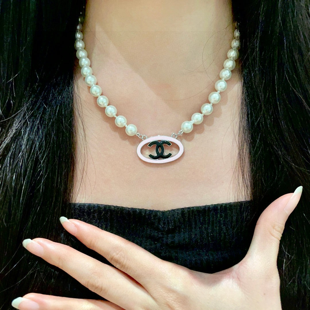 Double-C Emblem Pearl-Detail Pendant Necklace – Pearl Detail – Design 077 front product view