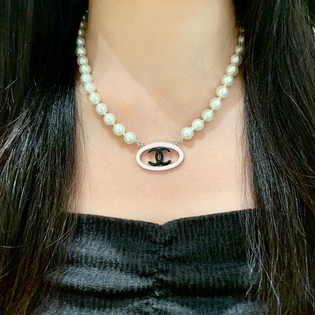 Double-C Emblem Pearl-Detail Pendant Necklace – Pearl Detail – Design 077 detail view