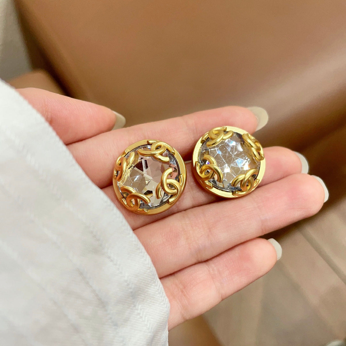 Double-C Emblem Stud Earrings in Polished Metal-Tone – Design 121 side detail