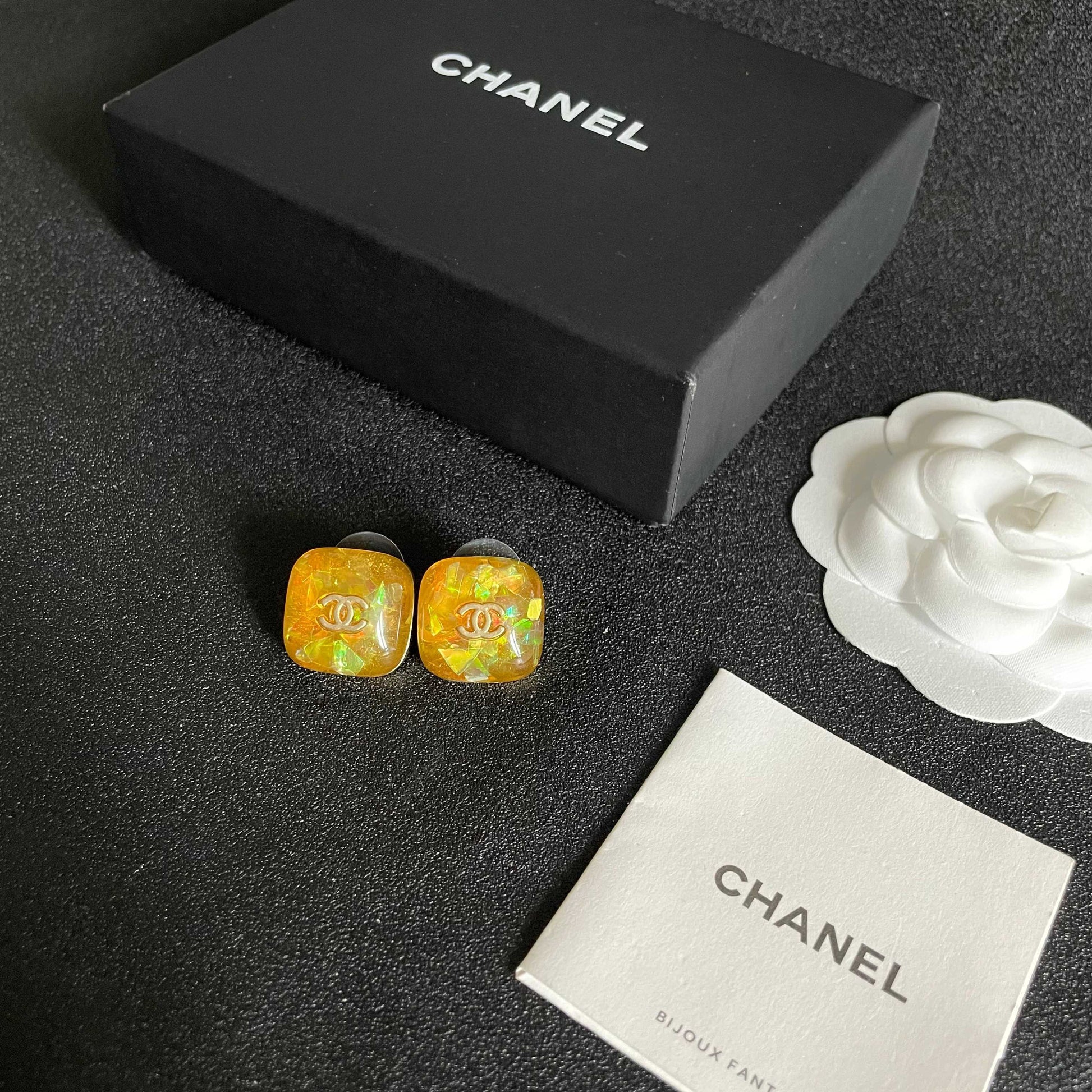 Double-C Emblem Stud Earrings in Polished Metal-Tone – Design 101 close-up detail