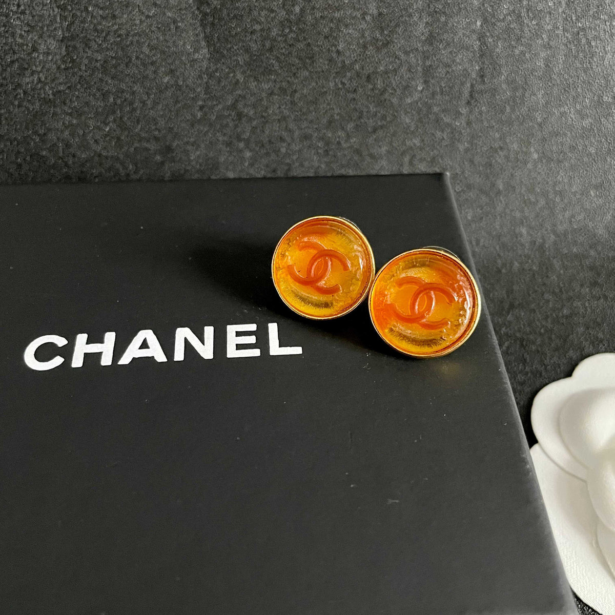 Double-C Emblem Stud Earrings in Polished Metal-Tone – Design 143 detail view