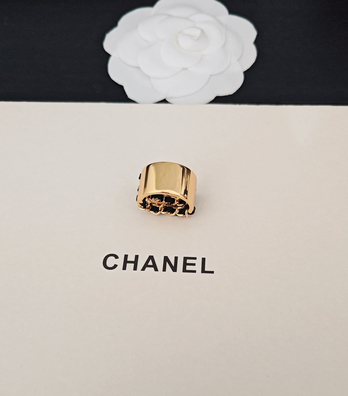 Signature Emblem Statement Ring in Gold-Tone – Black Detail close-up detail