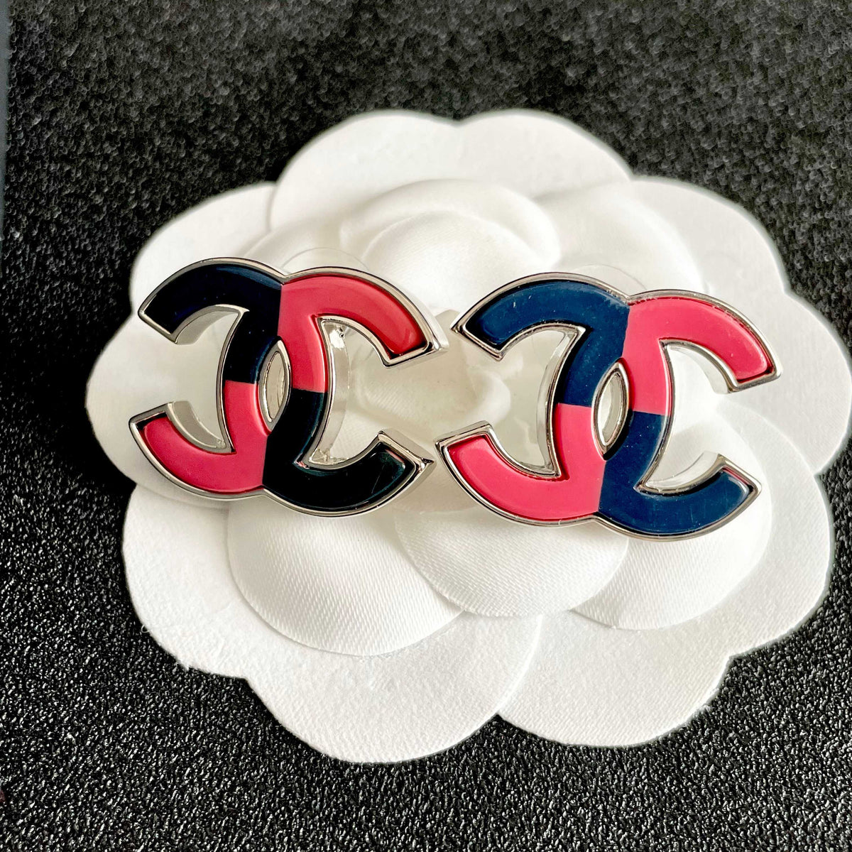 Double-C Emblem Stud Earrings in Polished Metal-Tone – Design 209 front product view
