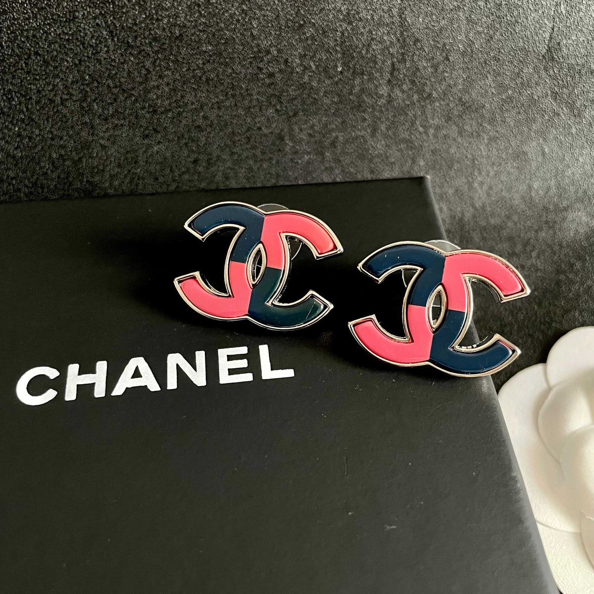 Double-C Emblem Stud Earrings in Polished Metal-Tone – Design 209 detail view