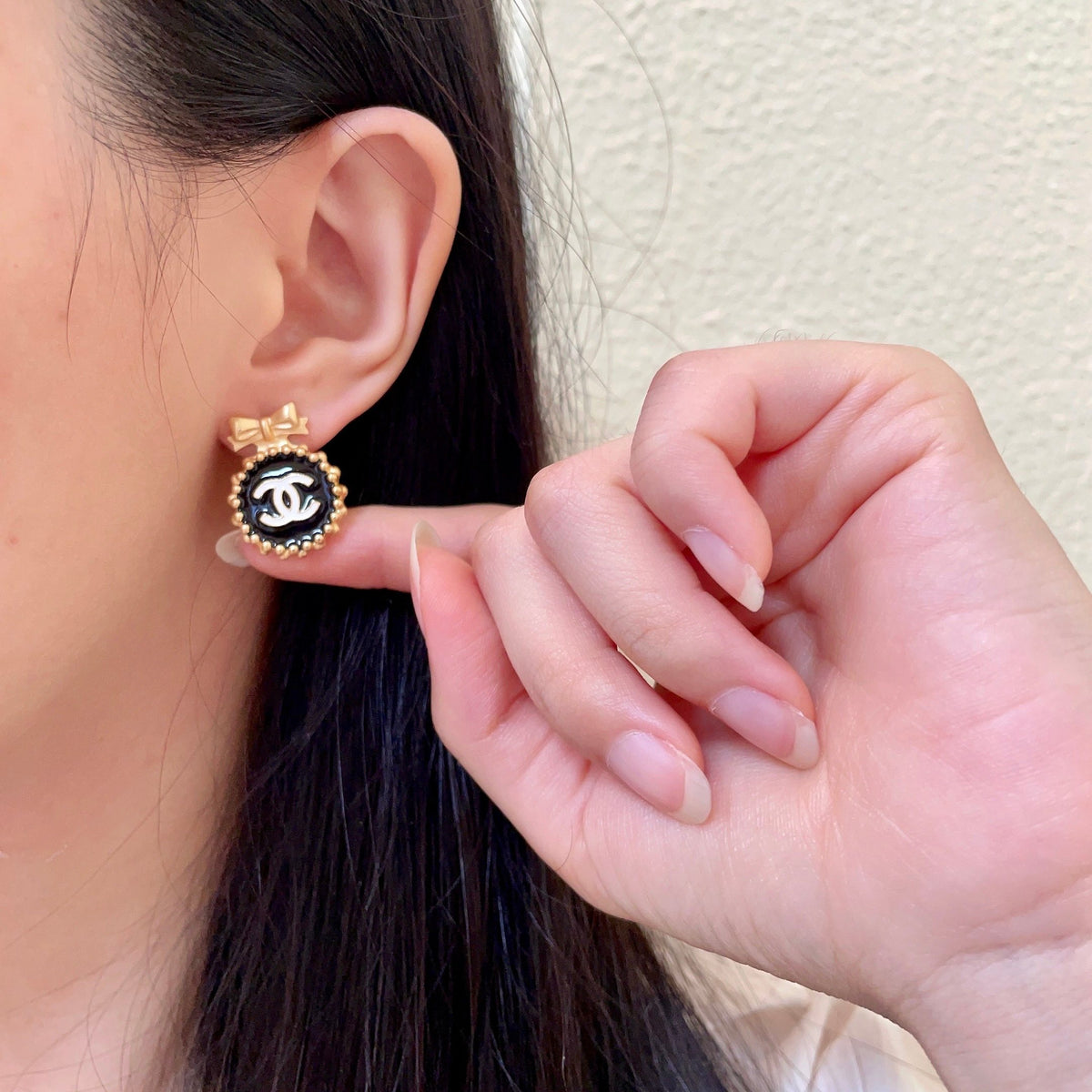Double-C Emblem Stud Earrings in Polished Metal-Tone – Design 208 front product view
