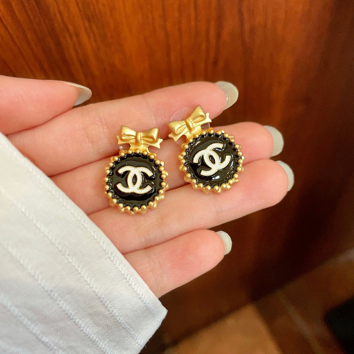 Double-C Emblem Stud Earrings in Polished Metal-Tone – Design 208 side detail