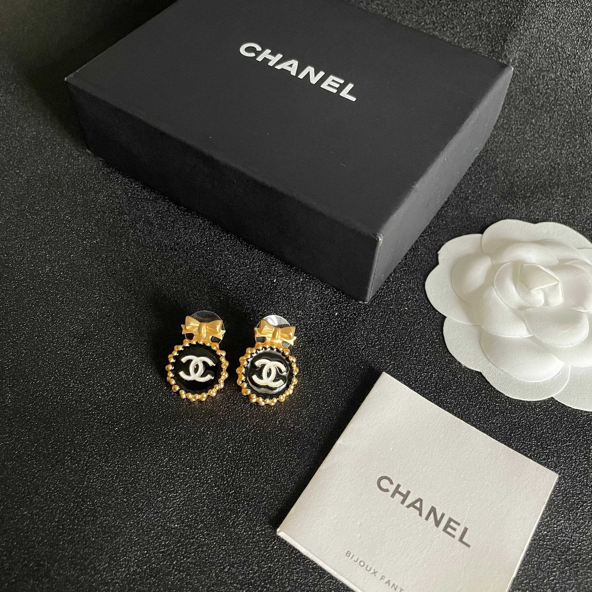 Double-C Emblem Stud Earrings in Polished Metal-Tone – Design 208 close-up detail