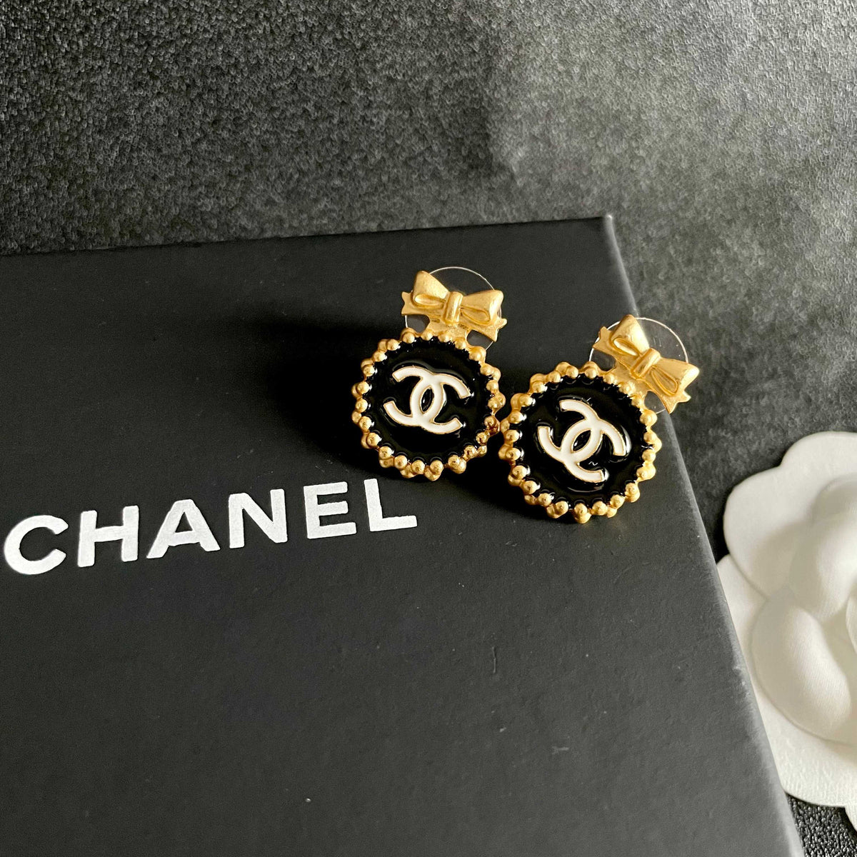 Double-C Emblem Stud Earrings in Polished Metal-Tone – Design 208 detail view